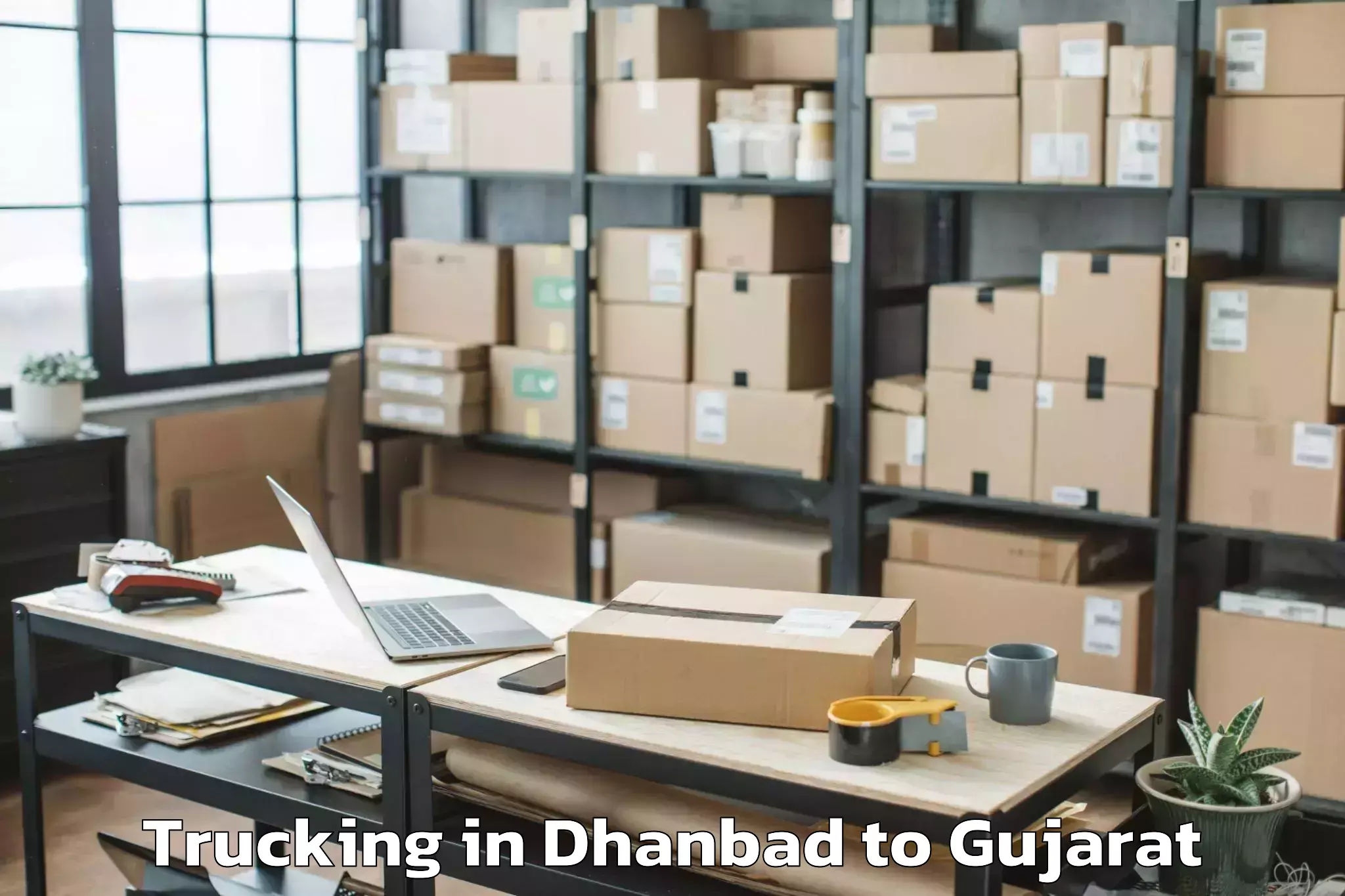 Discover Dhanbad to Talala Trucking